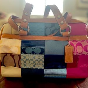 Beautiful multi color COACH blue lining